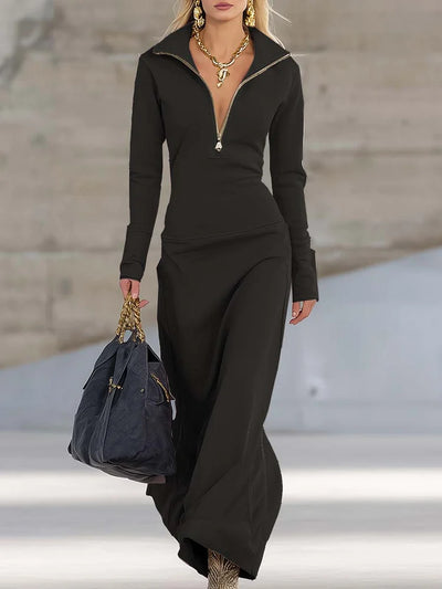 Elegante vestido largo rosa deportivo retro con escote en V y cremallera frontal de manga larga