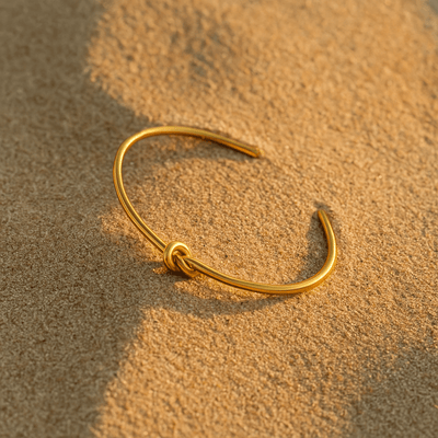 Pulsera Bormio – Brazalete fino con nudo en oro o plata