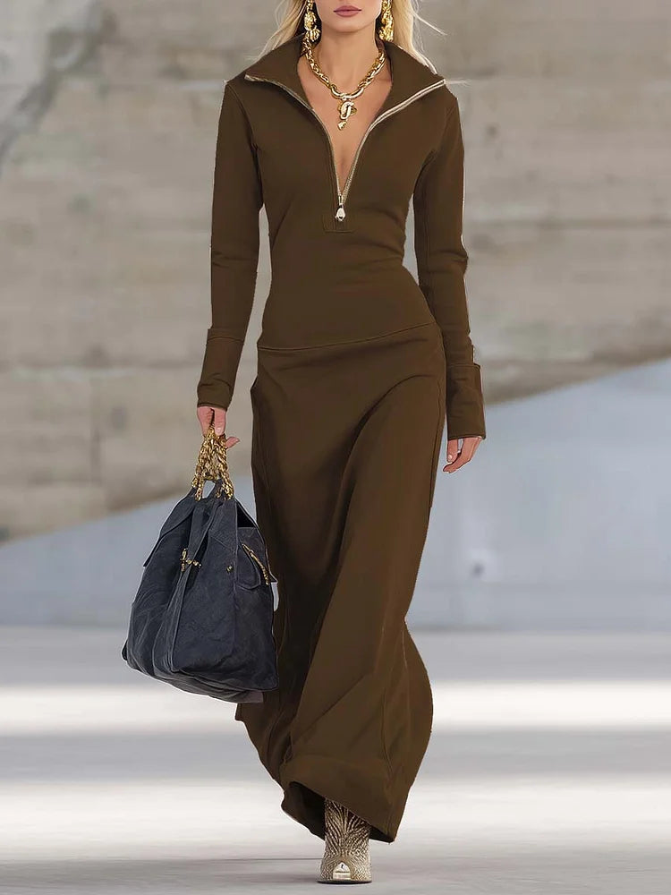 Elegante vestido largo rosa deportivo retro con escote en V y cremallera frontal de manga larga