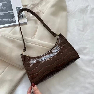 Bolso Cora – Mini baguette croco vegano con cremallera